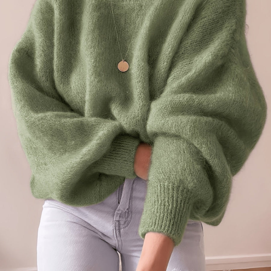 Lösstickad tröja med rund hals och lång ärm - Fluffig design med ribbstickade muddar