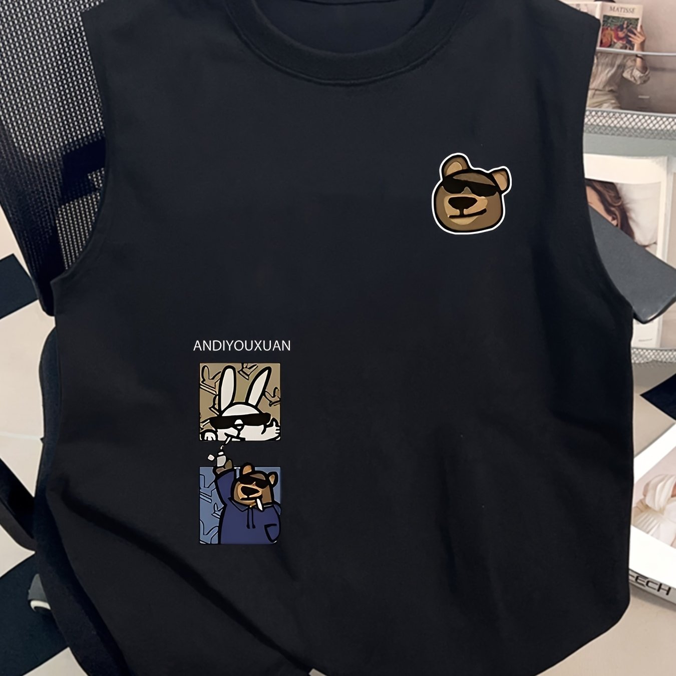 Herrarnas ärmlösa streetwear-topp med tecknad grafik och avslappnad stil