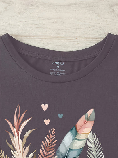Dam T-shirt med blommigt och fjädertryck, avslappnad stil, perfekt för vardagsbruk