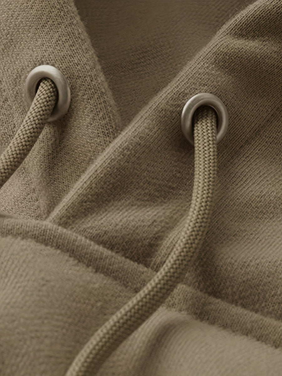 Herrhoodie med ficka och texttryck, stickade detaljer på ärmarna, khaki/svart