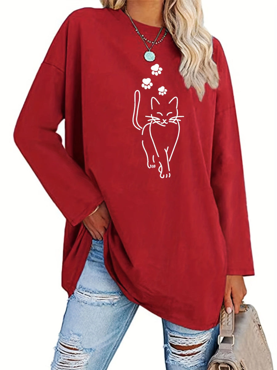 Svart långärmad tröja med kattmotiv och tassavtryck, oversized passform