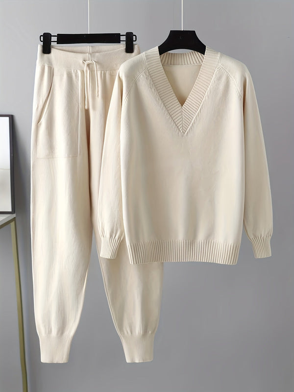 Stickat tvilling-set dam V-ringad tröja och byxor med mudd beige