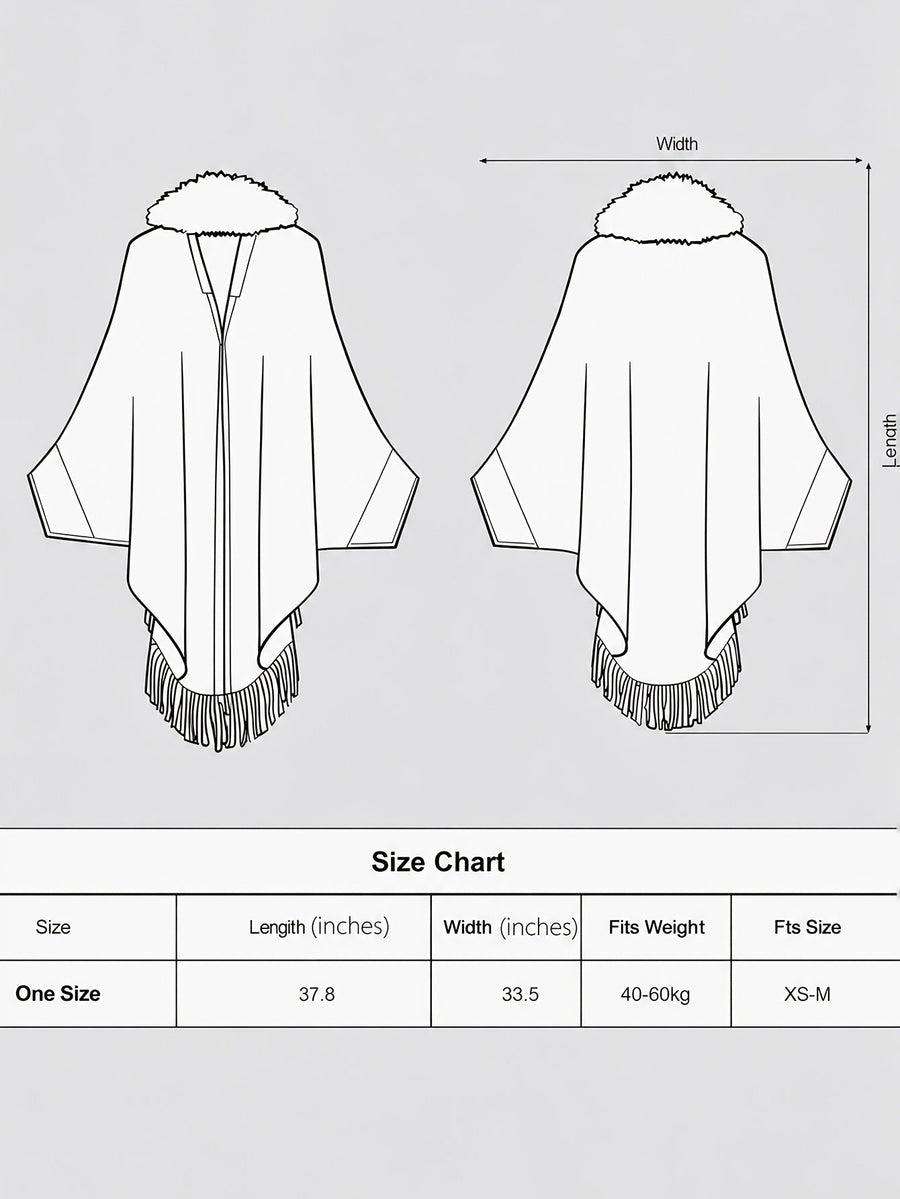 Stickad damponcho med fuskpäls och fransar