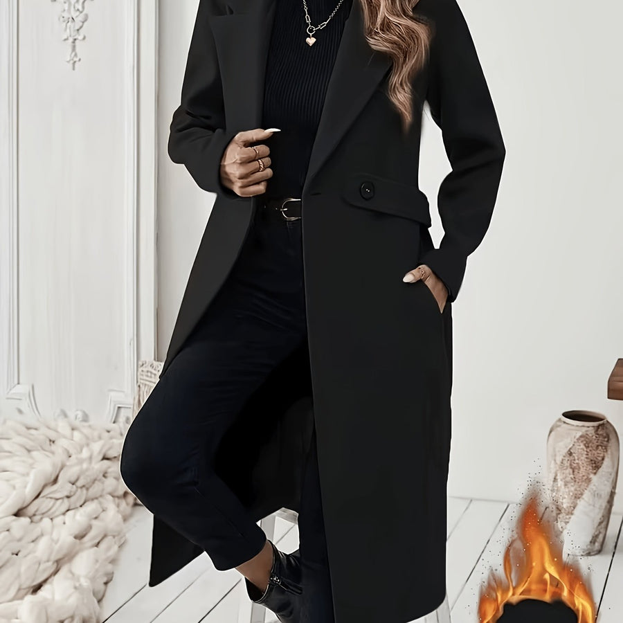 Damkappa med slag och fickor, lång modell i enfärgad design