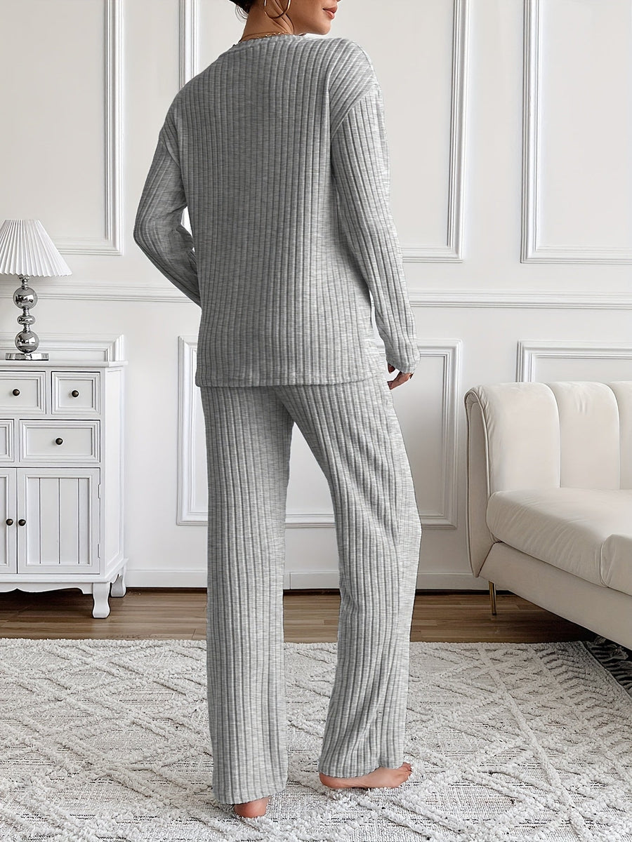 Ribbad loungewearset med V-ringning och tryck, långärmad tröja och vida byxor för dam