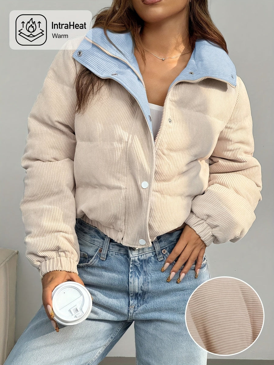 Kort corduroy pufferjacka med ståkrage i tvåfärgad design
