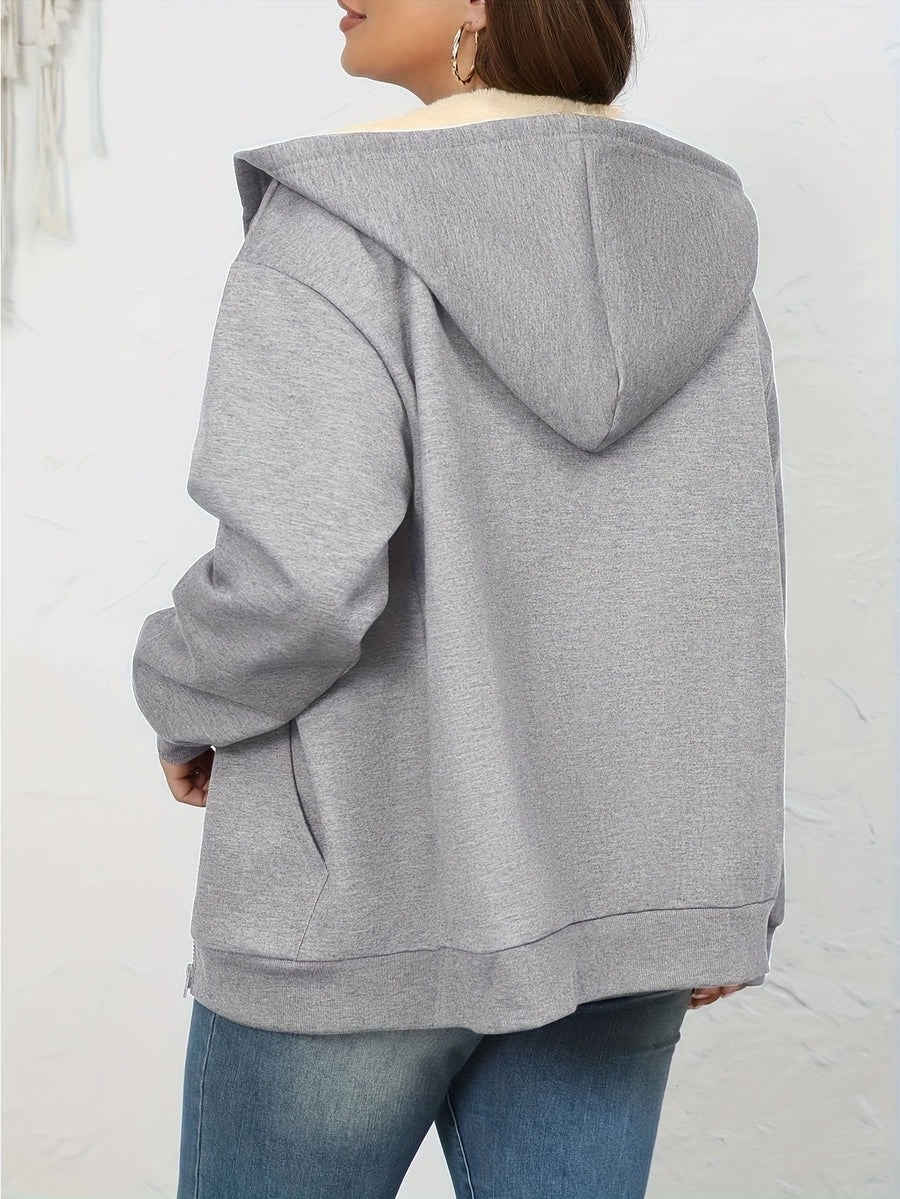 Damhoodie med dragkedja och pälsimitationfodrad luva, två fickor fram