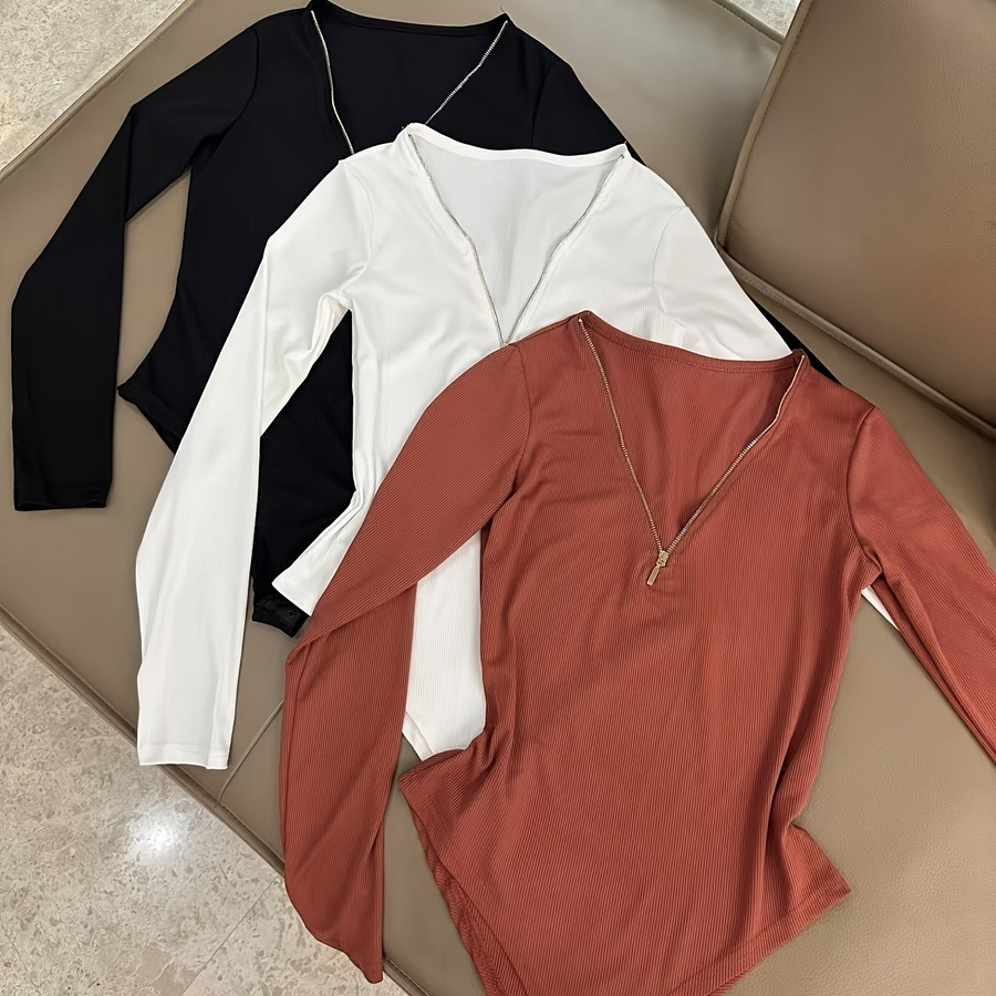 Dam bodysuit med dragkedja i ribbat material och lång ärm, flerfärgad