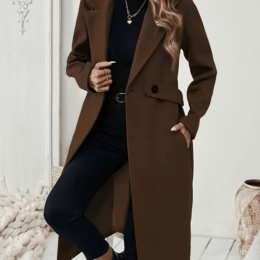 Damkappa med slag och fickor, lång modell i enfärgad design