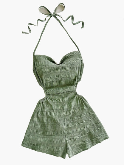 Dam Playsuit med Halterneck och Cut-Out – Trendig Sommarstil för Semester och Strand
