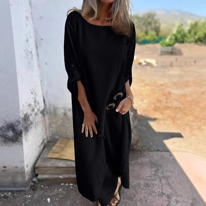 Imogen – Lång kostym med metallknappdesign och rund hals, långärmad topp och raka byxor
