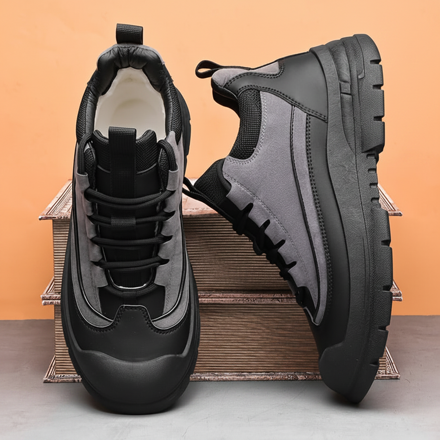 Herrsneakers i tvåfärgad design med tjock sula, snörning och förstärkt tåhätta