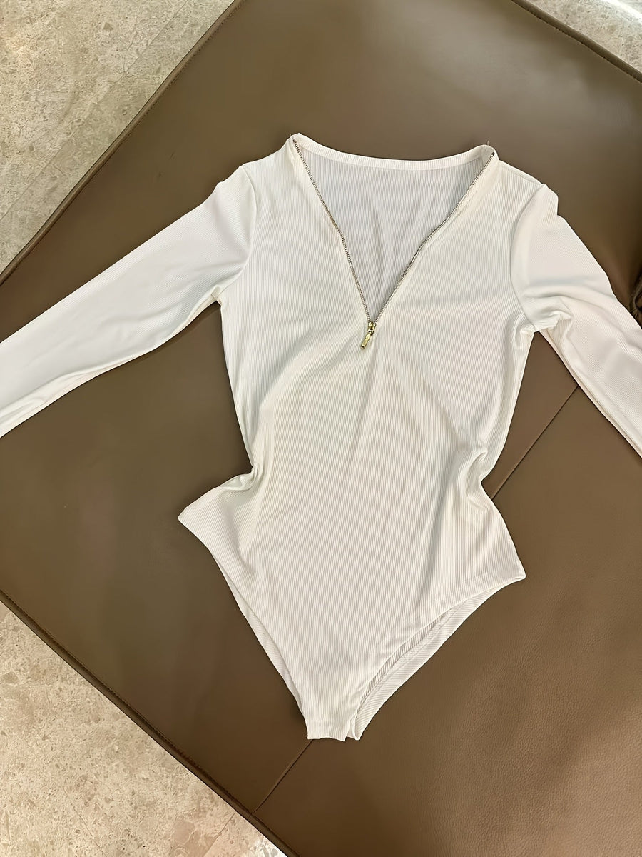 Dam bodysuit med dragkedja i ribbat material och lång ärm, flerfärgad