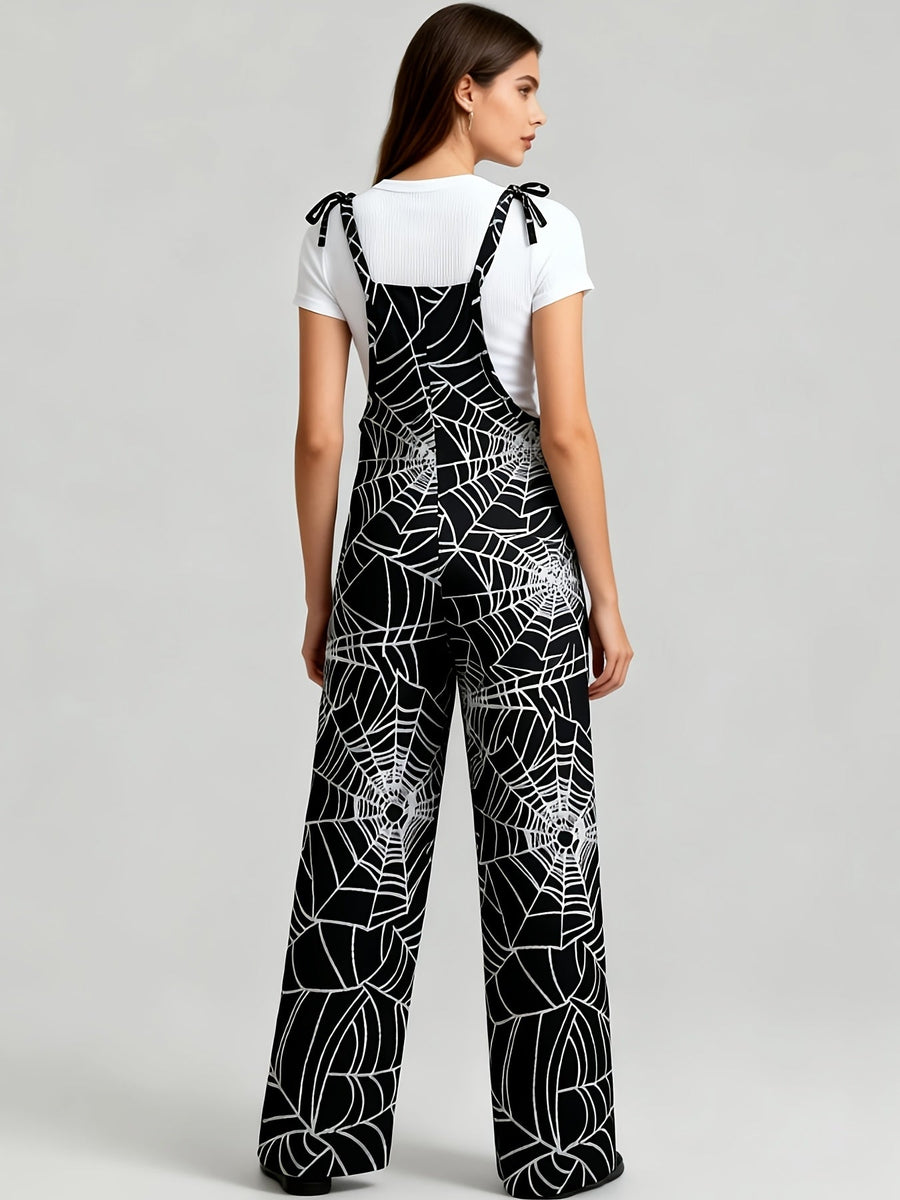 Dam jumpsuit med spindelnätsmönster och breda ben, svart
