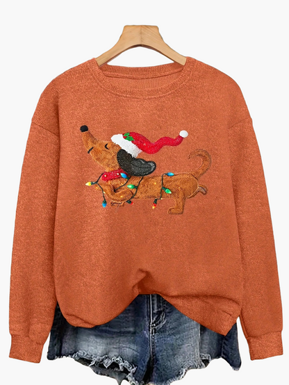 Damtröja med julmotiv och tax – julig och avslappnad stickad pullover