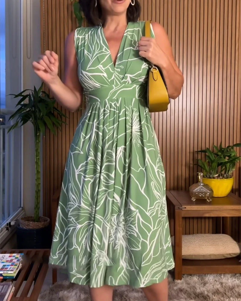 Damklänning med V-ringning och blommönster, Ärmlös A-linjemodell