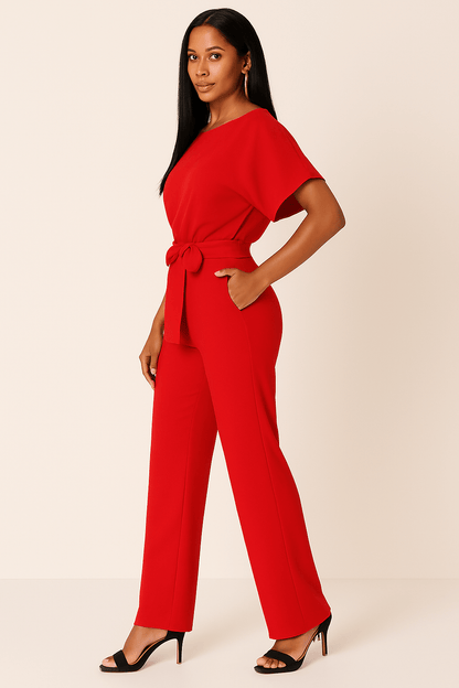 Dam Jumpsuit med Knytband i Midjan – Elegant och Mångsidig Fest- och Vardagsoutfit